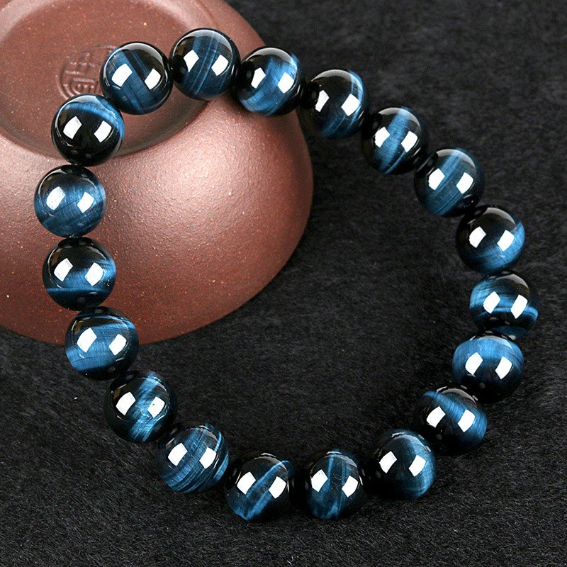 Blue Tiger Eye Courage Bracelet — worn on the wrist