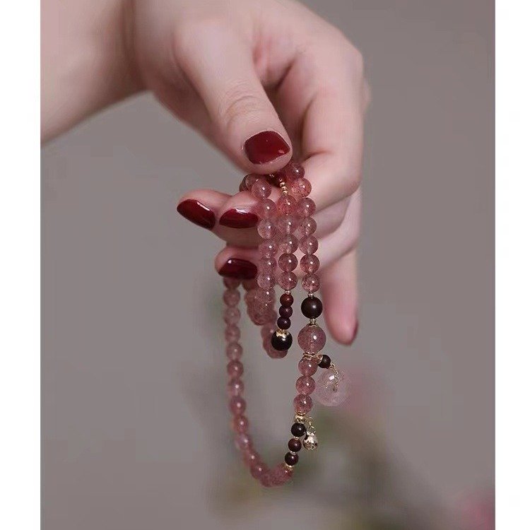 Triple-Wrap Strawberry Quartz Bracelet — styled view