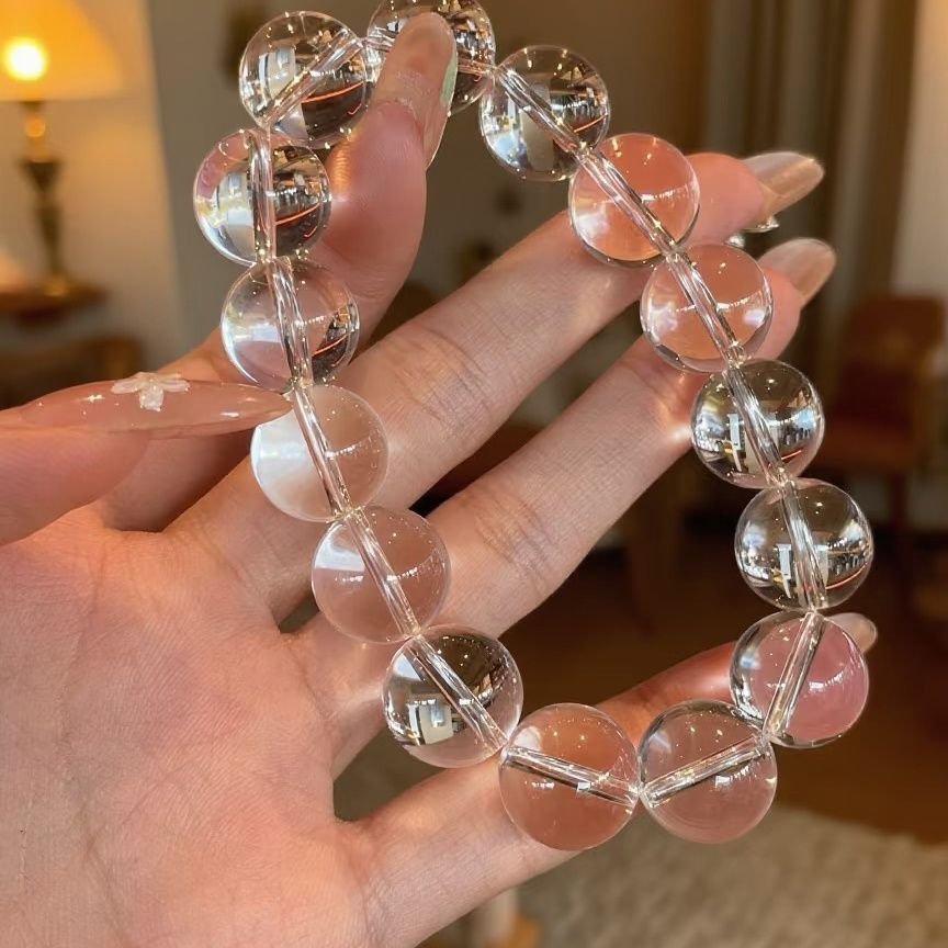 White Crystal Peace Buckle Bracelet — close-up bead detail