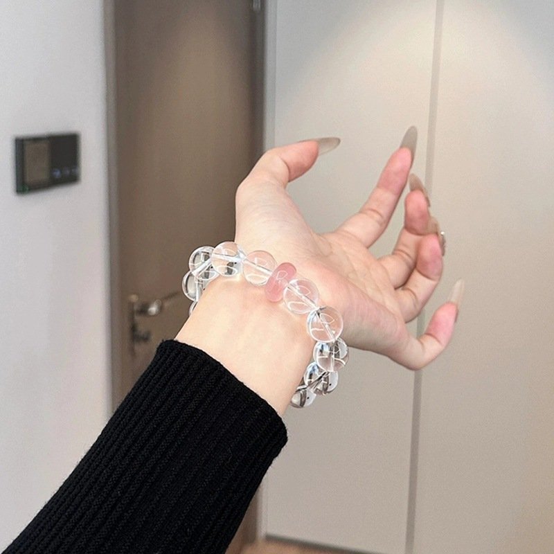 White Crystal Peace Buckle Bracelet — worn on the wrist